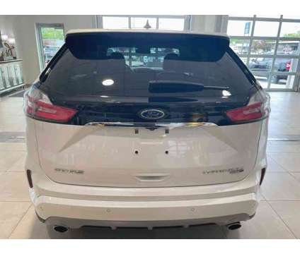 2019UsedFordUsedEdgeUsed4dr AWD is a Silver, White 2019 Ford Edge Car for Sale in Milwaukee WI