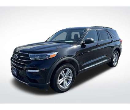 2022 Ford Explorer XLT is a Black 2022 Ford Explorer XLT Car for Sale in Plymouth WI