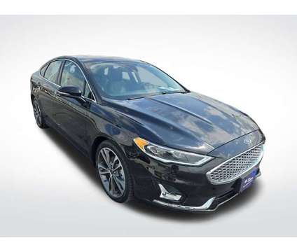 2020 Ford Fusion Titanium is a Black 2020 Ford Fusion Titanium Car for Sale in Plymouth WI