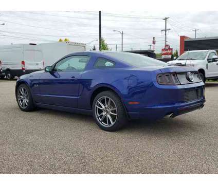 2014 Ford Mustang GT Premium is a Blue 2014 Ford Mustang GT Car for Sale in Paw Paw MI
