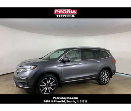 2019 Honda Pilot Touring is a 2019 Honda Pilot Touring Car for Sale in Peoria IL