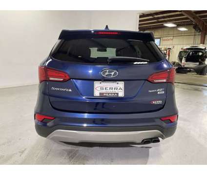 2018 Hyundai Santa Fe Sport 2.0T is a Blue 2018 Hyundai Santa Fe Sport Car for Sale in Traverse City MI