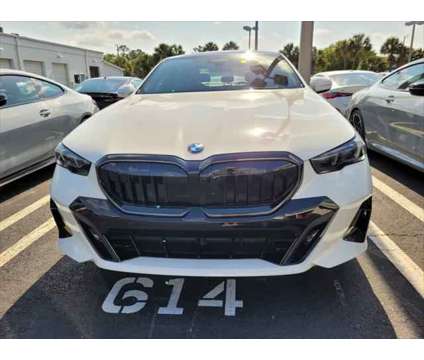 2024 BMW 5 Series i xDrive is a White 2024 BMW 5-Series Sedan in Jacksonville FL