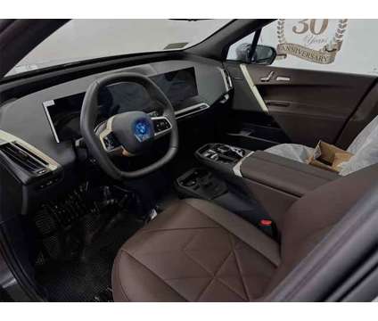 2025 BMW iX xDrive50 is a Grey 2025 BMW 325 Model iX SUV in Peabody MA