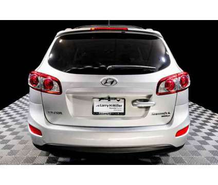 2011 Hyundai Santa Fe SE is a Silver 2011 Hyundai Santa Fe SE SUV in Peoria AZ