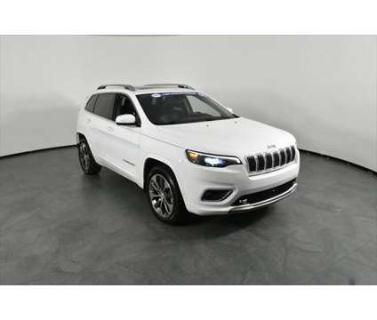 2019 Jeep Cherokee Overland FWD is a White 2019 Jeep Cherokee Overland SUV in Orlando FL
