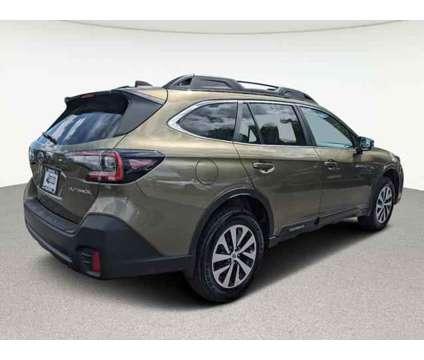 2021 Subaru Outback Premium is a Green 2021 Subaru Outback 2.5i Station Wagon in Englewood CO