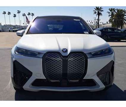 2025 BMW iX xDrive50 is a White 2025 BMW 325 Model iX SUV in Alhambra CA