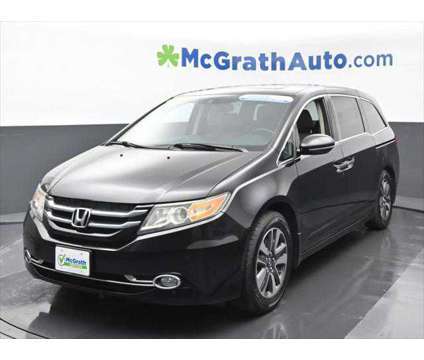 2016 Honda Odyssey Touring is a 2016 Honda Odyssey Touring Van in Dubuque IA