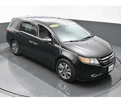 2016 Honda Odyssey Touring is a 2016 Honda Odyssey Touring Van in Dubuque IA