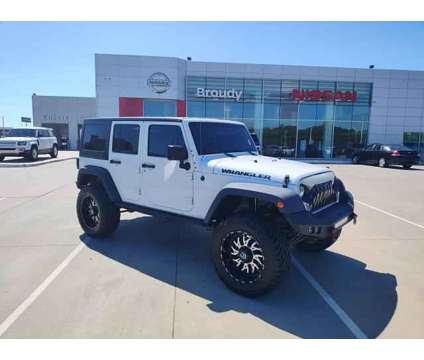 2016 Jeep Wrangler Unlimited Black Bear is a White 2016 Jeep Wrangler Unlimited SUV in Ardmore OK