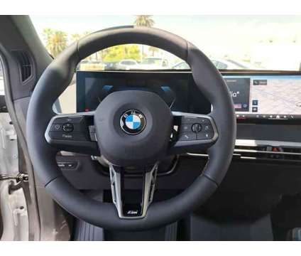 2025 BMW iX xDrive50 is a White 2025 BMW 325 Model iX SUV in Alhambra CA