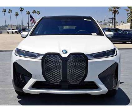 2025 BMW iX xDrive50 is a White 2025 BMW 325 Model iX SUV in Alhambra CA