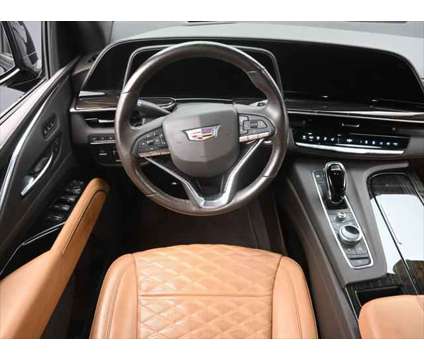 2021 Cadillac Escalade 4WD Sport is a Black 2021 Cadillac Escalade 4WD SUV in Dubuque IA