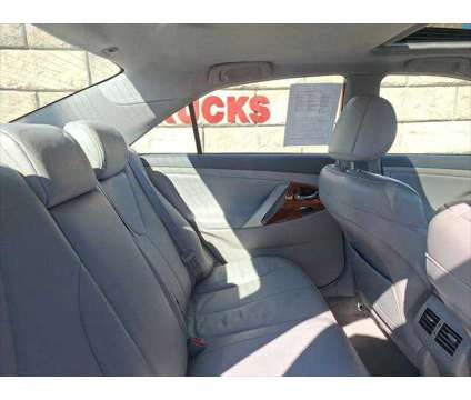 2008 Toyota Camry LE V6 is a Silver 2008 Toyota Camry LE Sedan in Dubuque IA