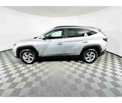 2022 Hyundai Tucson SEL is a Silver 2022 Hyundai Tucson SUV in Raynham MA