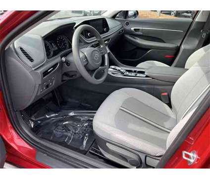 2021 Hyundai Sonata SE is a Red 2021 Hyundai Sonata SE Sedan in Kennesaw GA