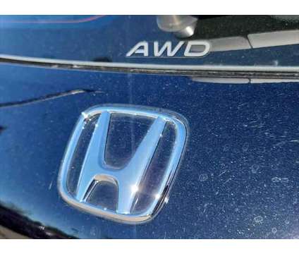 2024 Honda HR-V AWD LX is a Black 2024 Honda HR-V Station Wagon in Loveland CO