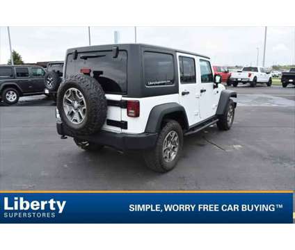 2014 Jeep Wrangler Unlimited Rubicon is a White 2014 Jeep Wrangler Unlimited Rubicon SUV in Rapid City SD
