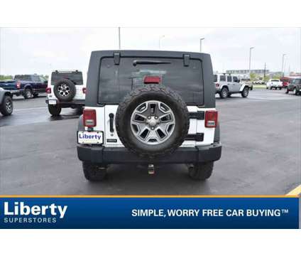 2014 Jeep Wrangler Unlimited Rubicon is a White 2014 Jeep Wrangler Unlimited Rubicon SUV in Rapid City SD