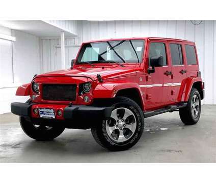 2018 Jeep Wrangler JK Unlimited Sahara is a Red 2018 Jeep Wrangler SUV in Madison WI