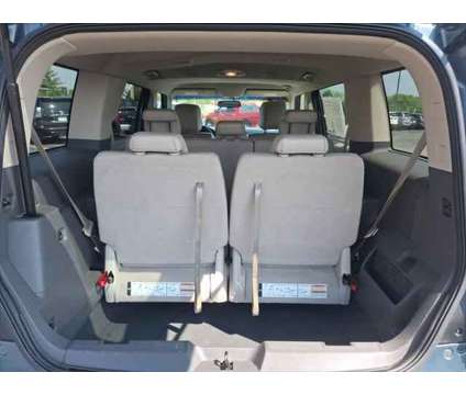 2010 Ford Flex SEL is a Blue 2010 Ford Flex SEL Station Wagon in Dubuque IA