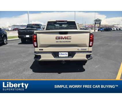 2023 GMC Sierra 1500 4WD Crew Cab Standard Box Elevation is a Tan 2023 GMC Sierra 1500 Truck in Rapid City SD