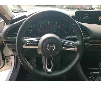 2019 Mazda MAZDA3 Premium Package is a White 2019 Mazda MAZDA 3 sp Sedan in Elmhurst IL