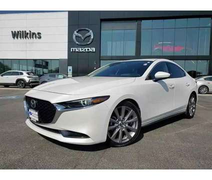 2019 Mazda MAZDA3 Premium Package is a White 2019 Mazda MAZDA 3 sp Sedan in Elmhurst IL