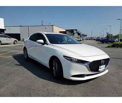 2019 Mazda MAZDA3 Premium Package is a White 2019 Mazda MAZDA 3 sp Sedan in Elmhurst IL