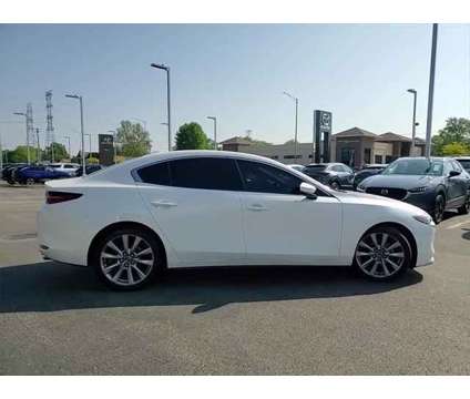 2019 Mazda MAZDA3 Premium Package is a White 2019 Mazda MAZDA 3 sp Sedan in Elmhurst IL