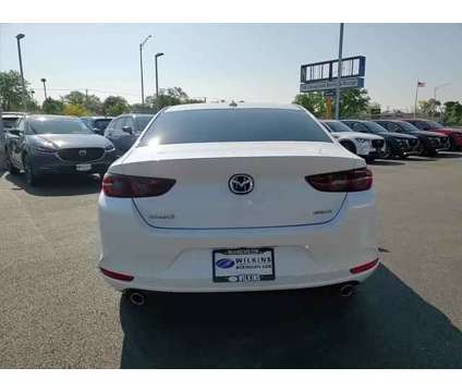 2019 Mazda MAZDA3 Premium Package is a White 2019 Mazda MAZDA 3 sp Sedan in Elmhurst IL