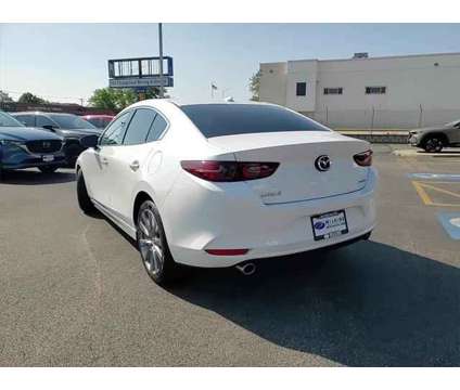 2019 Mazda MAZDA3 Premium Package is a White 2019 Mazda MAZDA 3 sp Sedan in Elmhurst IL