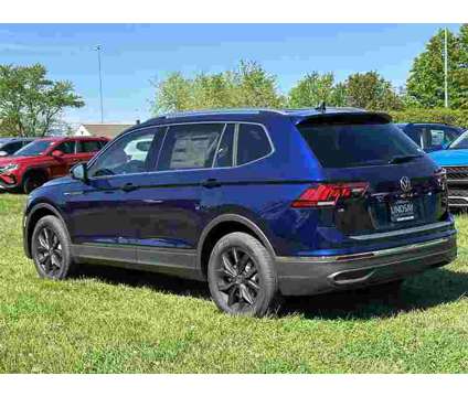 2024 Volkswagen Tiguan 2.0T SE is a Blue 2024 Volkswagen Tiguan 2.0T S SUV in Sterling VA