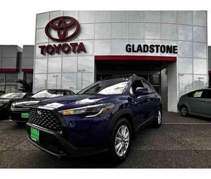 2024 Toyota Corolla Cross LE is a Blue 2024 Toyota Corolla LE SUV in Gladstone OR