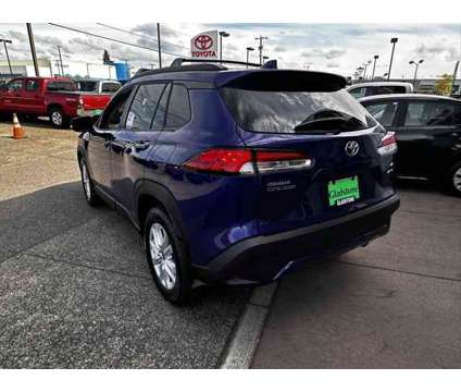 2024 Toyota Corolla Cross LE is a Blue 2024 Toyota Corolla LE SUV in Gladstone OR