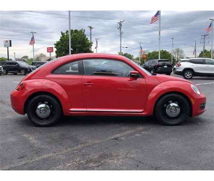 2014 Volkswagen Beetle 1.8T is a Red 2014 Volkswagen Beetle 1.8T Hatchback in Neenah WI