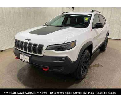2022 Jeep Cherokee Trailhawk 4WD is a White 2022 Jeep Cherokee Trailhawk SUV in Saint Charles IL