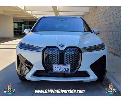 2024 BMW iX xDrive50 is a White 2024 BMW 325 Model iX SUV in Riverside CA