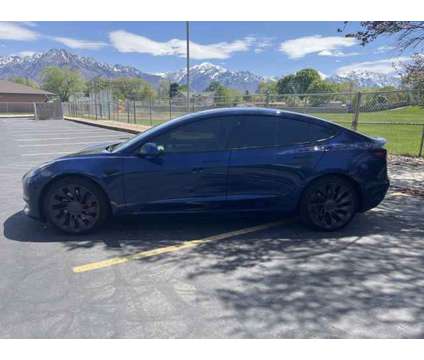 2022 Tesla Model 3 Performance LONG RANGE AWD is a Blue 2022 Tesla Model 3 Sedan in Salt Lake City UT
