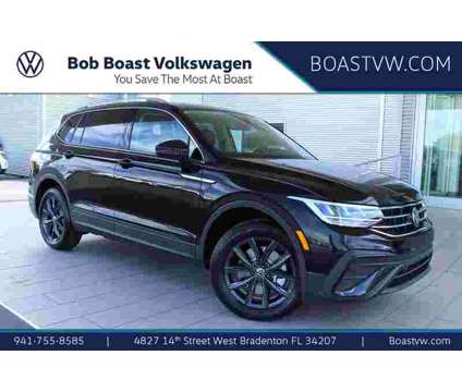 2024 Volkswagen Tiguan 2.0T SE is a Black 2024 Volkswagen Tiguan 2.0T S SUV in Bradenton FL