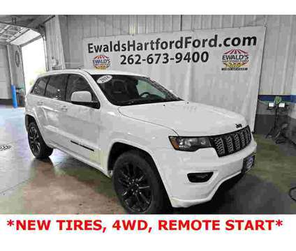2018 Jeep Grand Cherokee Altitude is a White 2018 Jeep grand cherokee Altitude SUV in Milwaukee WI