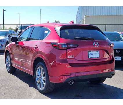 2024 Mazda CX-5 2.5 Turbo Signature is a Red 2024 Mazda CX-5 SUV in Littleton CO