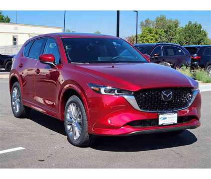 2024 Mazda CX-5 2.5 Turbo Signature is a Red 2024 Mazda CX-5 SUV in Littleton CO