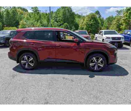 2024 Nissan Rogue SL is a Red 2024 Nissan Rogue SL SUV in Bowie MD