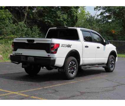 2023 Nissan Titan PRO-4X is a White 2023 Nissan Titan PRO-4X Truck in Oconomowoc WI