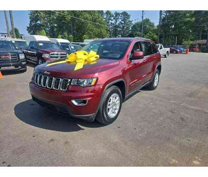 2018 Jeep Grand Cherokee for sale is a Red 2018 Jeep grand cherokee Car for Sale in Marietta GA