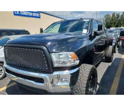 2013 Ram 2500 Crew Cab for sale is a Black 2013 RAM 2500 Model Car for Sale in West Park FL