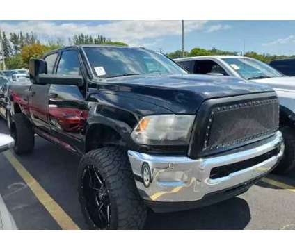 2013 Ram 2500 Crew Cab for sale is a Black 2013 RAM 2500 Model Car for Sale in West Park FL
