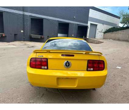 2005 Ford Mustang for sale is a Yellow 2005 Ford Mustang Car for Sale in Englewood CO
